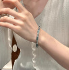 Plain-face Bracelet With An Open Design Featuring Blue-water Jade In A Traditional Ethnic Style